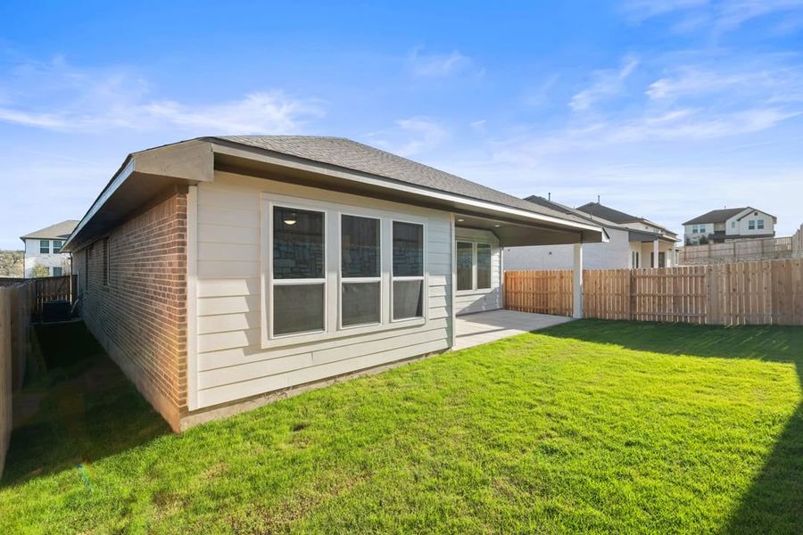 Exterior details and patio area of a home in Park Collection at Lariat, Liberty Hill (Image 27). Exterior details and patio area of a home in Park Collection at Lariat, Liberty Hill (Image 27).