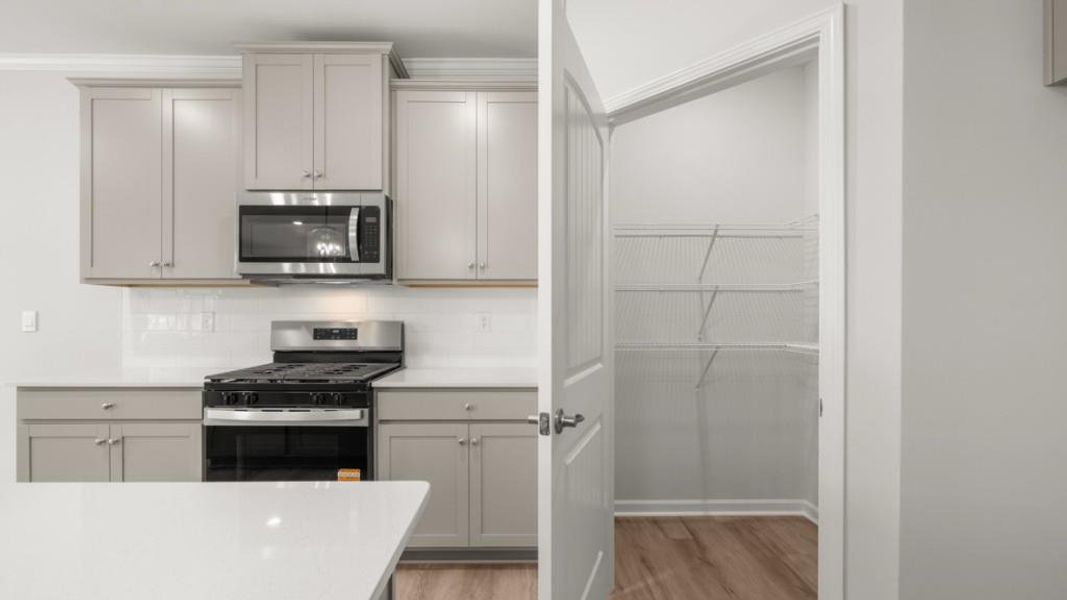 Furnished interior view inside a new home in Fairway 17 at Mirror Lake, Villa Rica (Image 9). Furnished interior view inside a new home in Fairway 17 at Mirror Lake, Villa Rica (Image 9).