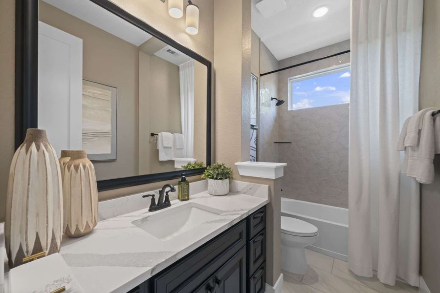 Furnished interior view inside a new home in The Highlands, Porter (Image 10).