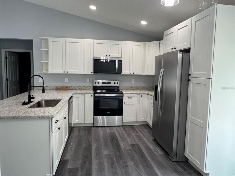 Furnished interior view inside a new home in , Dunnellon (Image 3).