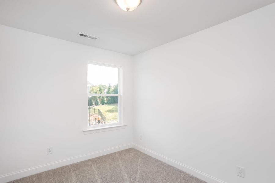 Spacious, unfurnished interior of a new home in Enclave at Traditions Townhomes, Wake Forest (Image 16).
