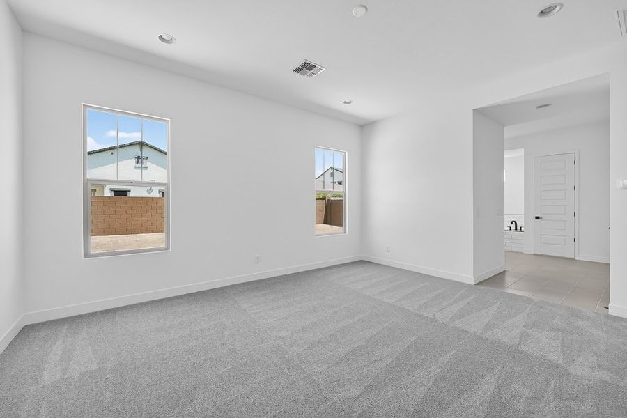 Spacious, unfurnished interior of a new home in Ellsworth Ranch, Queen Creek (Image 20).