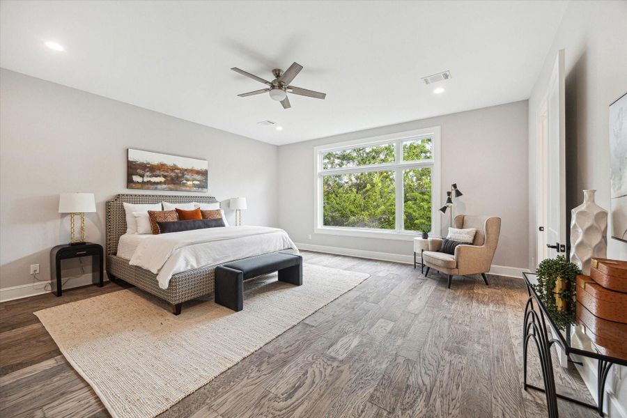 Primary Bedroom Suite with tree top views Primary Bedroom Suite with tree top views