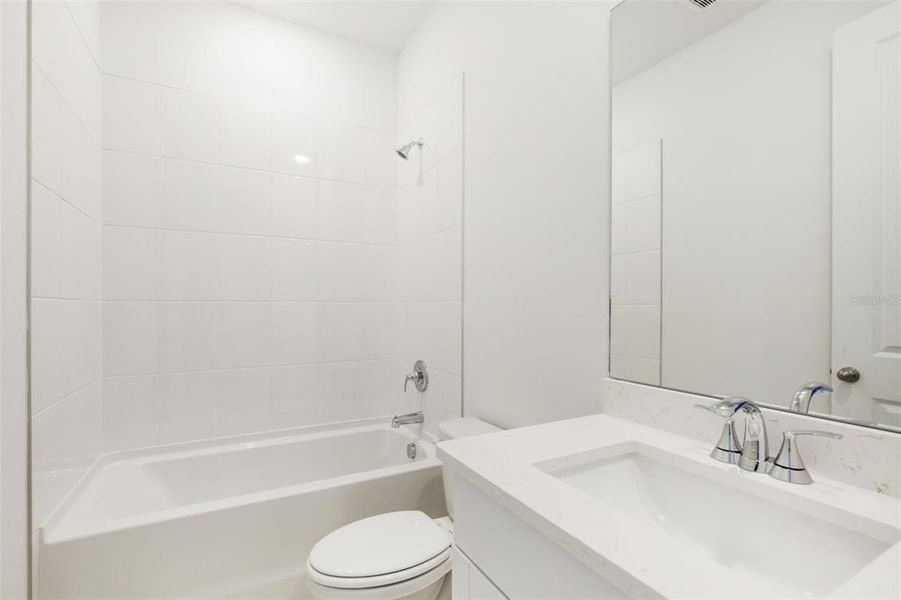 Furnished interior view inside a new home in Coasterra - Reserve Series, Palmetto (Image 15).