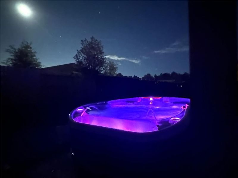 The hot tub gives a wonderful ambiance at night