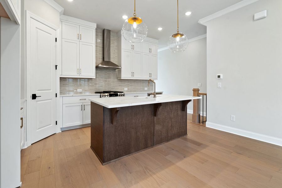 Representative furnished interior of a home built from the 
                        
                         by The Providence Group in Ward's Crossing Townhomes, Johns Creek (Image 12).