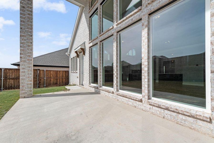 Exterior details and patio area of a home in Monterra, Fate (Image 3).