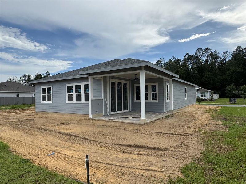 Exterior details and patio area of a home in Laureate Village, Newberry (Image 7).