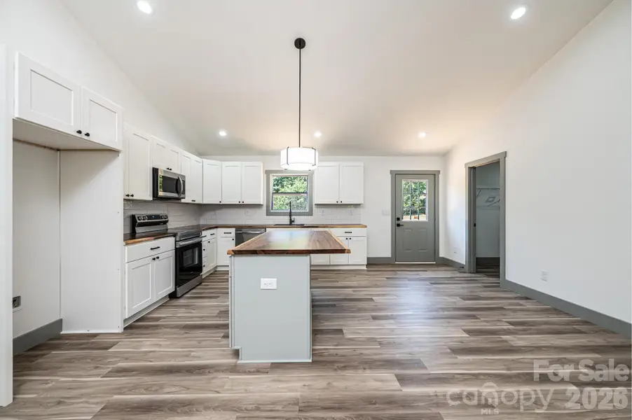 Stock Photo- Kitchen Island is White in this home Stock Photo- Kitchen Island is White in this home