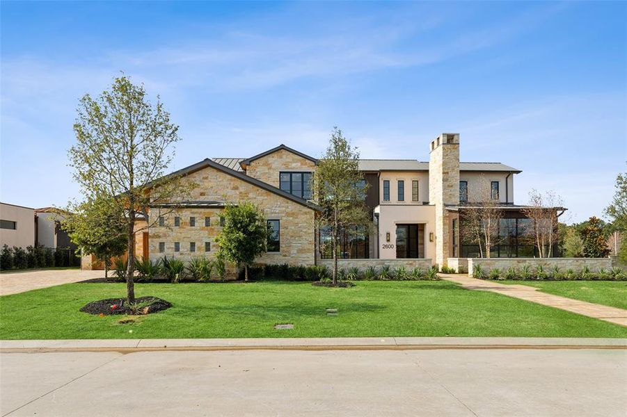 Front exterior of a new home in , Westlake, TX, highlighting curb appeal (Image 25).