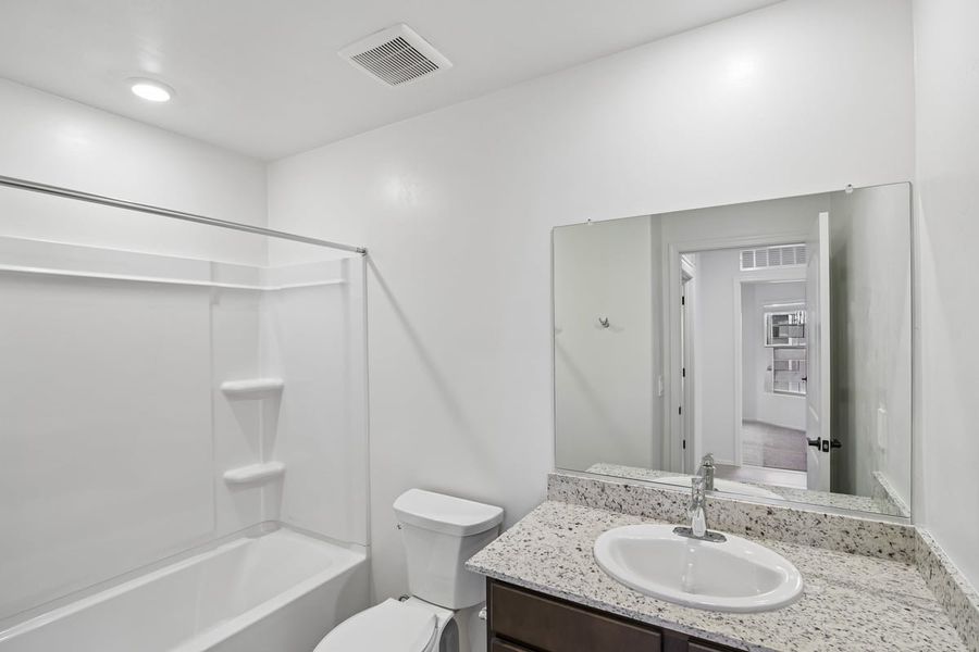 Furnished interior view inside a new home in The Landings at Rancho Del Lago, Vail (Image 6).