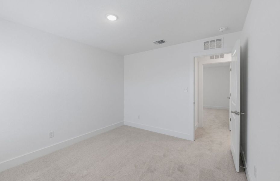 Spacious, unfurnished interior of a new home in Saddleback at Santa Rita Ranch, Liberty Hill (Image 18).