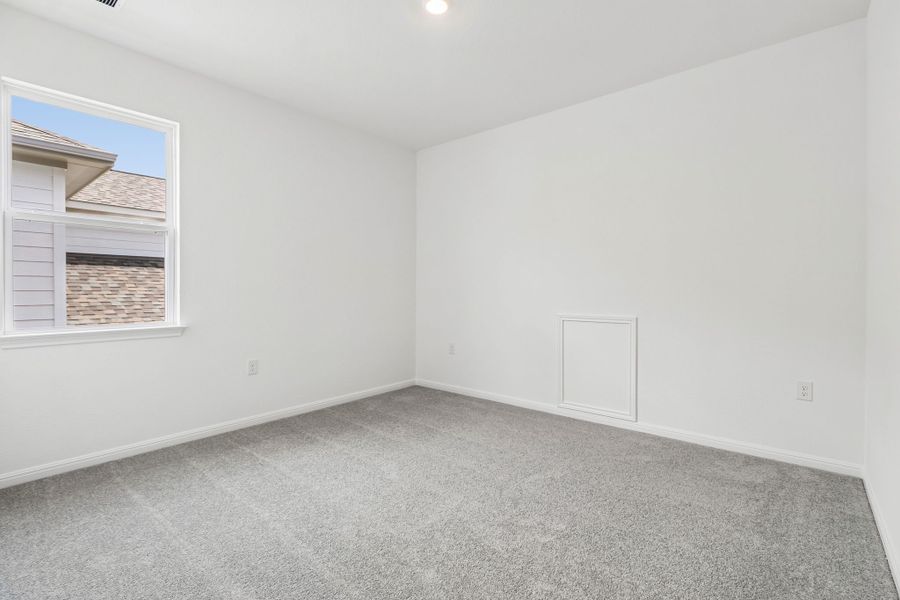 Spacious, unfurnished interior of a new home in Village Grove, Dripping Springs (Image 25).
