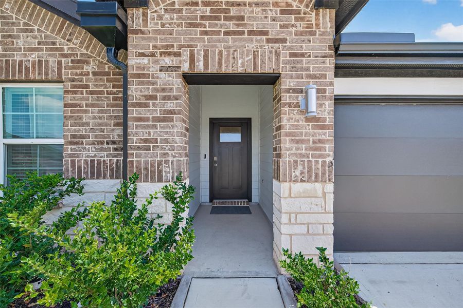 Front exterior of a new home in , Katy, TX, highlighting curb appeal (Image 1). Front exterior of a new home in , Katy, TX, highlighting curb appeal (Image 1).