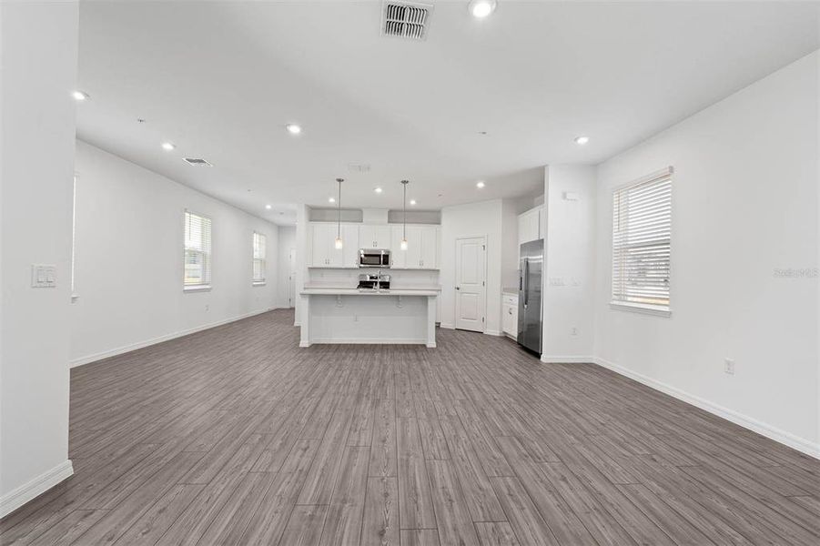 Spacious, unfurnished interior of a new home in Brack Ranch, St. Cloud (Image 36).