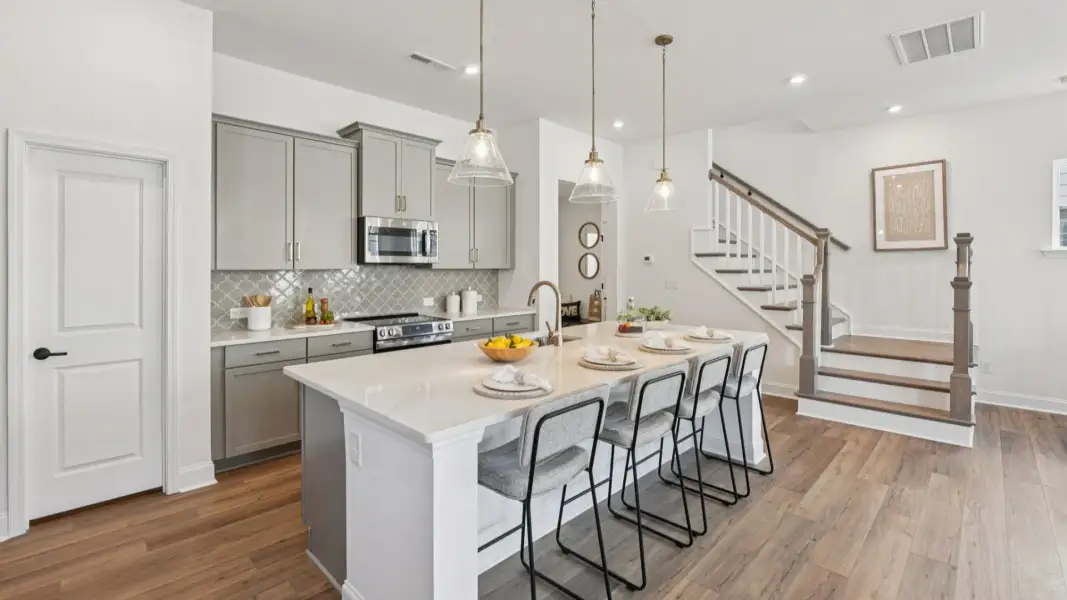 The Brentwood Plan by DRB Homes in The River District, Charlotte NC. - Kitchen