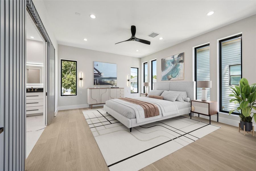 Virtually Staged. Ascending to the second floor, the primary suite awaits, a sanctuary of indulgence. Outfitted with wood flooring and recessed lighting the room is large enough for a sitting area. Virtually Staged. Ascending to the second floor, the primary suite awaits, a sanctuary of indulgence. Outfitted with wood flooring and recessed lighting the room is large enough for a sitting area.