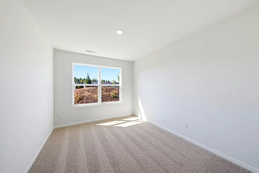 Spacious, unfurnished interior of a new home in Sweetbrier, Durham (Image 21).