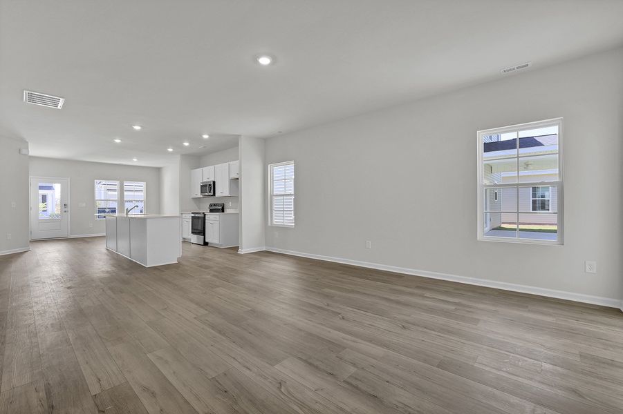 Spacious, unfurnished interior of a new home in River Tide Farms, Bolivia (Image 12).