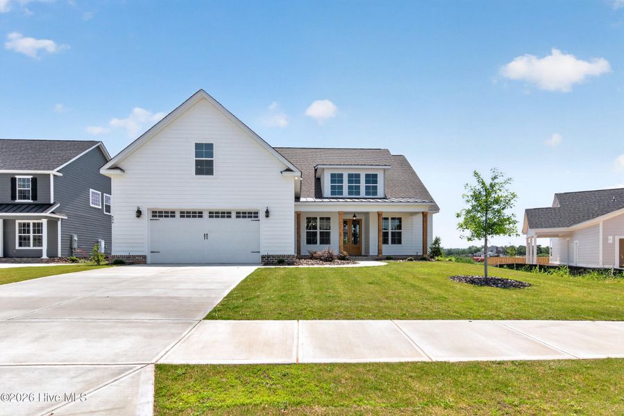 Front exterior of a new home in Highland Lakes, Evans, GA, highlighting curb appeal (Image 25).