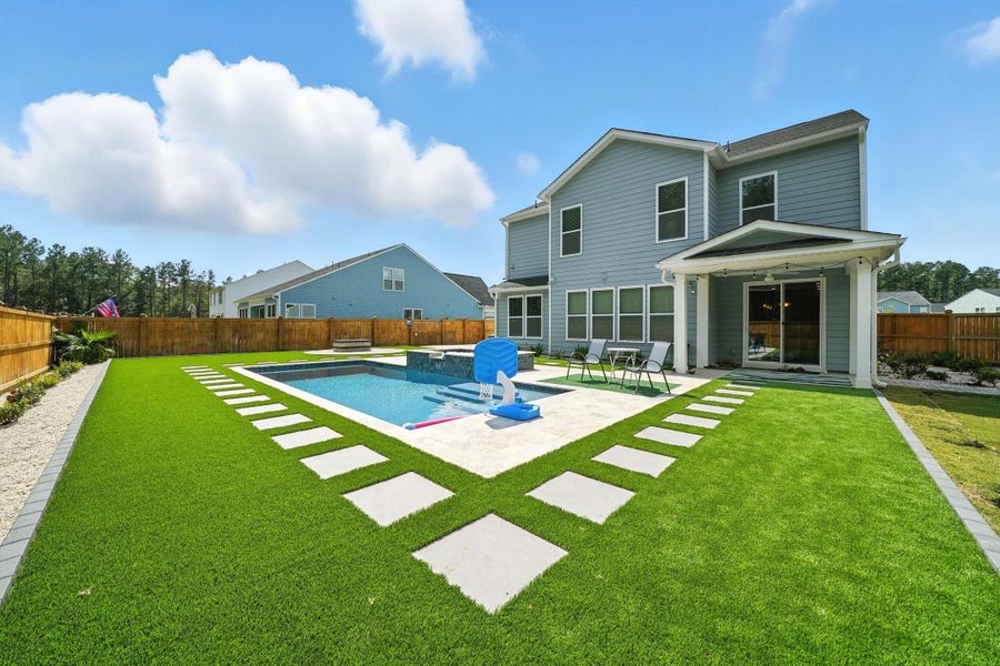 Front exterior of a new home in , Ravenel, SC, highlighting curb appeal (Image 22).