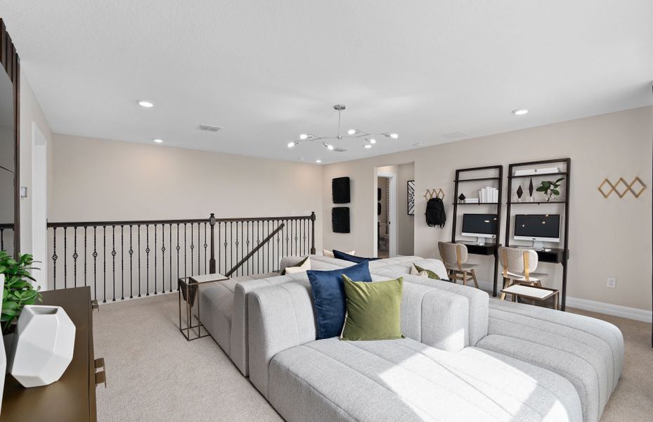 Representative furnished interior of a home built from the Mahogany Grand by Pulte Homes in Avera, Orlando (Image 13).