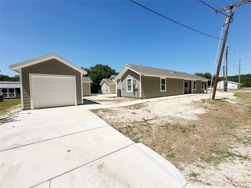 Front exterior of a new home in , Mineral Wells, TX, highlighting curb appeal (Image 15). Front exterior of a new home in , Mineral Wells, TX, highlighting curb appeal (Image 15).