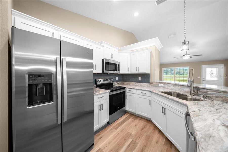Furnished interior view inside a new home in , Dunnellon (Image 10).
