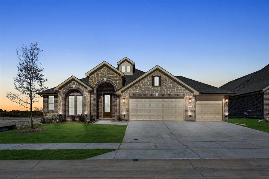Front exterior of a new home in Meadow Vista 60-65, Anna, TX, highlighting curb appeal (Image 1). Front exterior of a new home in Meadow Vista 60-65, Anna, TX, highlighting curb appeal (Image 1).