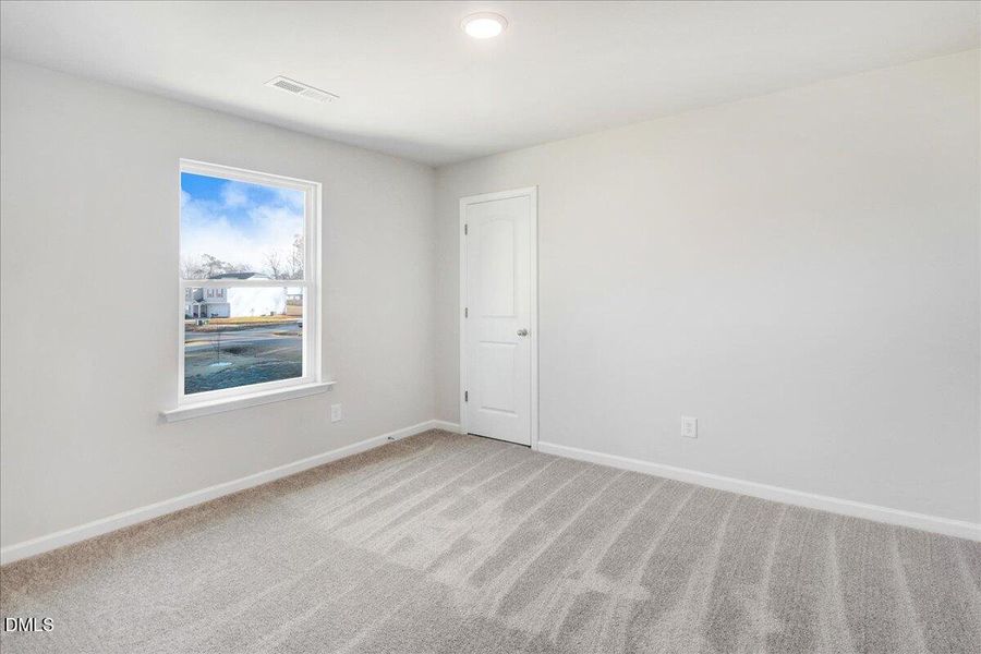 36-Bedroom with window and carpet floori