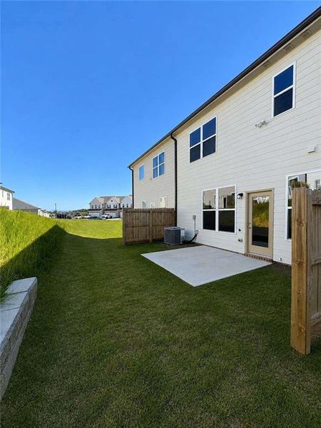 Exterior details and patio area of a home in Somerset at Riverbrook, Gainesville (Image 4).