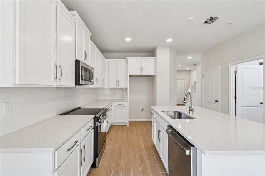 Furnished interior view inside a new home in Emerson Pointe, Apopka (Image 10).