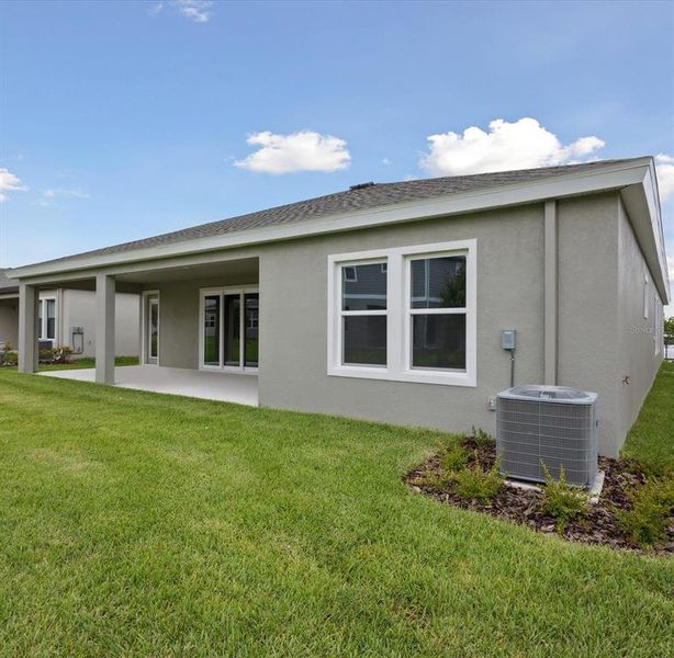 Front exterior of a new home in Waterset, Apollo Beach, FL, highlighting curb appeal (Image 19).