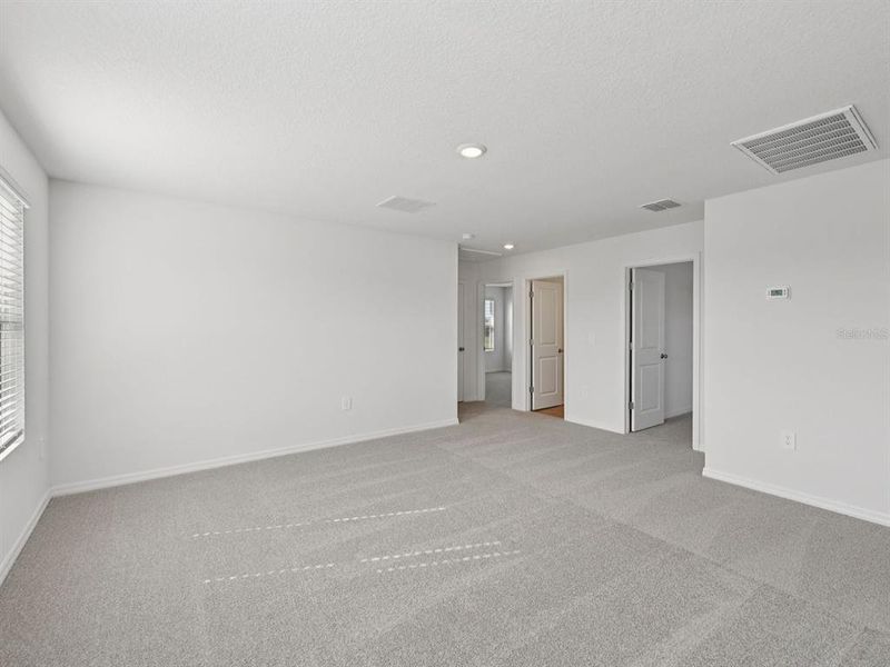 Spacious, unfurnished interior of a new home in Two Rivers - Premier Series, Zephyrhills (Image 13). Spacious, unfurnished interior of a new home in Two Rivers - Premier Series, Zephyrhills (Image 13).