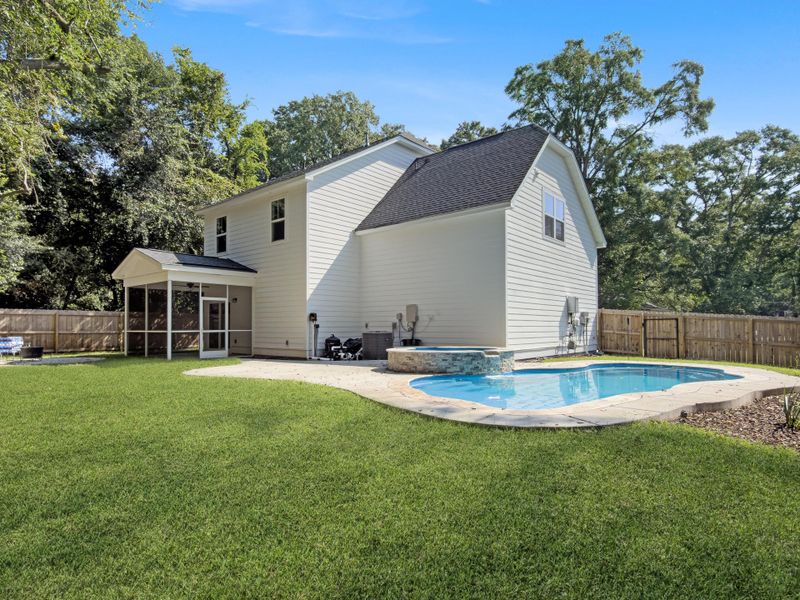 Exterior details and patio area of a home in , James Island (Image 29).
