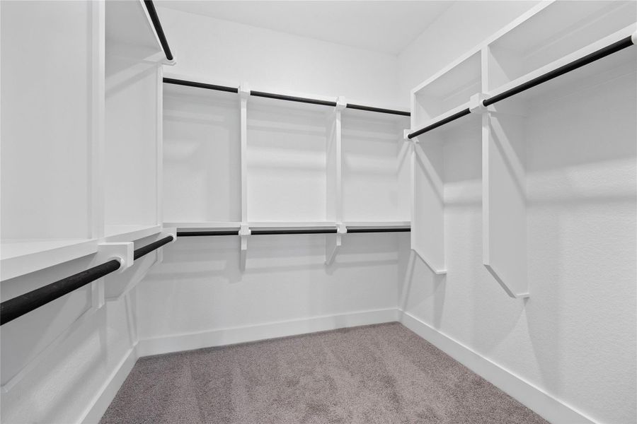 Look at this immaculate closet! With high shelving, multiple rows to hang clothing, you are sure to have enough room for all your belongings!