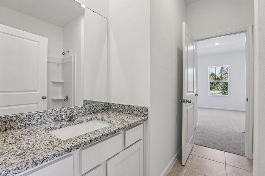 Representative furnished interior of a home built from the Halo by Starlight Homes in Hawks Run, Kissimmee (Image 12).