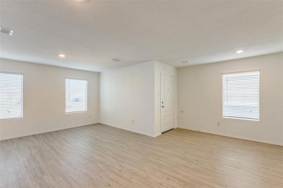 Spare room featuring light hardwood / wood-style flooring