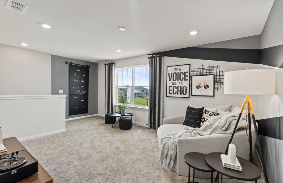 Representative furnished interior of a home built from the Morris by DiVosta in Talon Preserve on Palmer Ranch, Nokomis (Image 9).