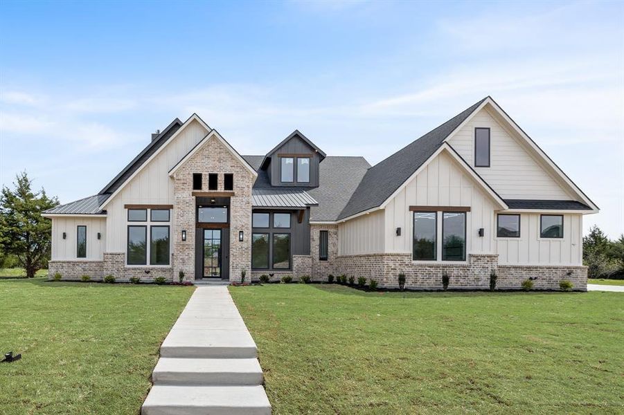 Front exterior of a new home in , Caddo Mills, TX, highlighting curb appeal (Image 26).