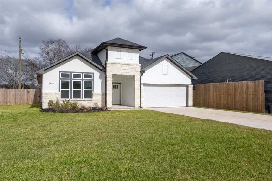 Single-story home fenced for privacy and has large front windows for natural light. Single-story home fenced for privacy and has large front windows for natural light.