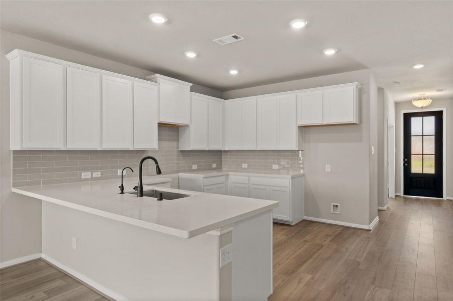 Furnished interior view inside a new home in Spring Creek Trails, Magnolia (Image 12).
