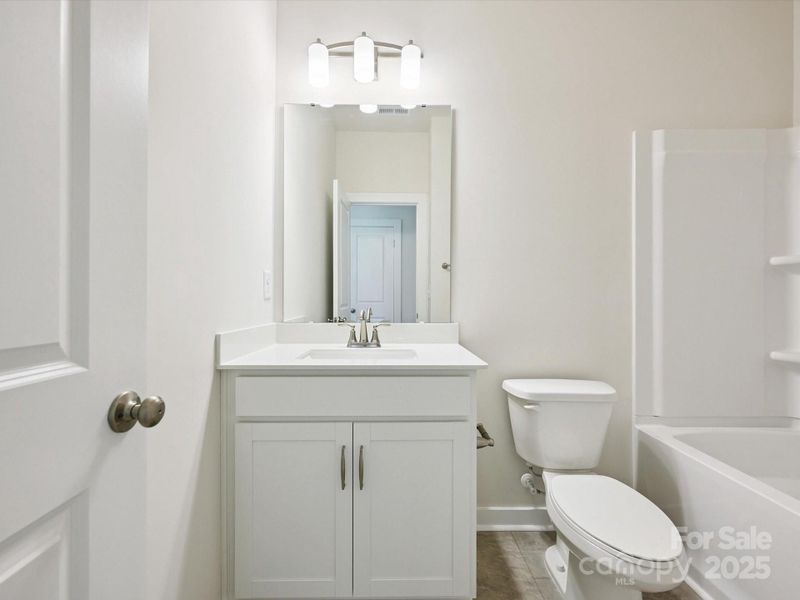 Furnished interior view inside a new home in Central Living at Craig, Charlotte (Image 8).