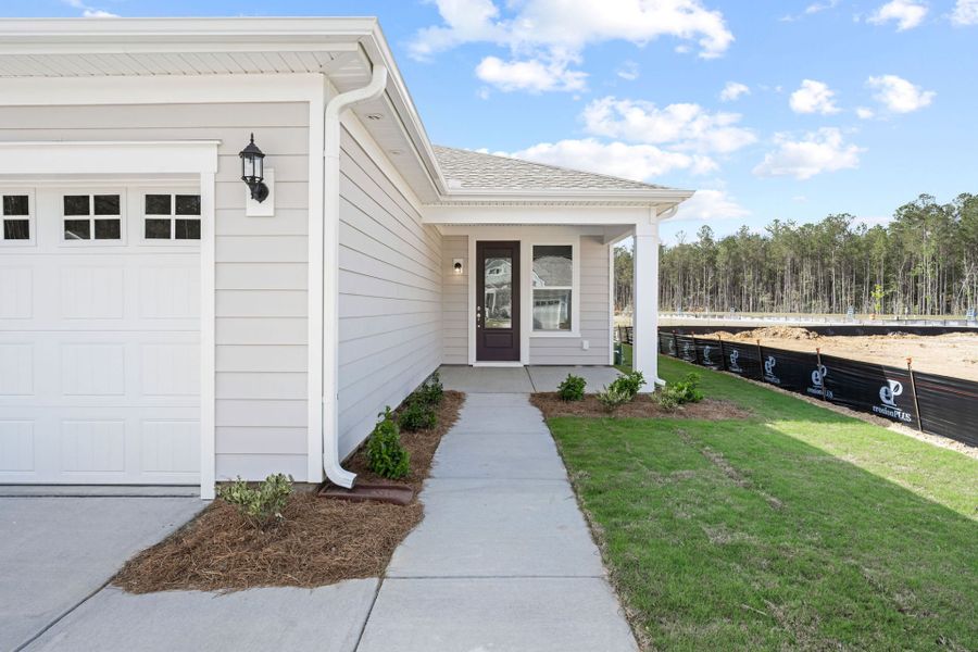 Exterior details and patio area of a home in Sun City Hilton Head, Bluffton (Image 16). Exterior details and patio area of a home in Sun City Hilton Head, Bluffton (Image 16).