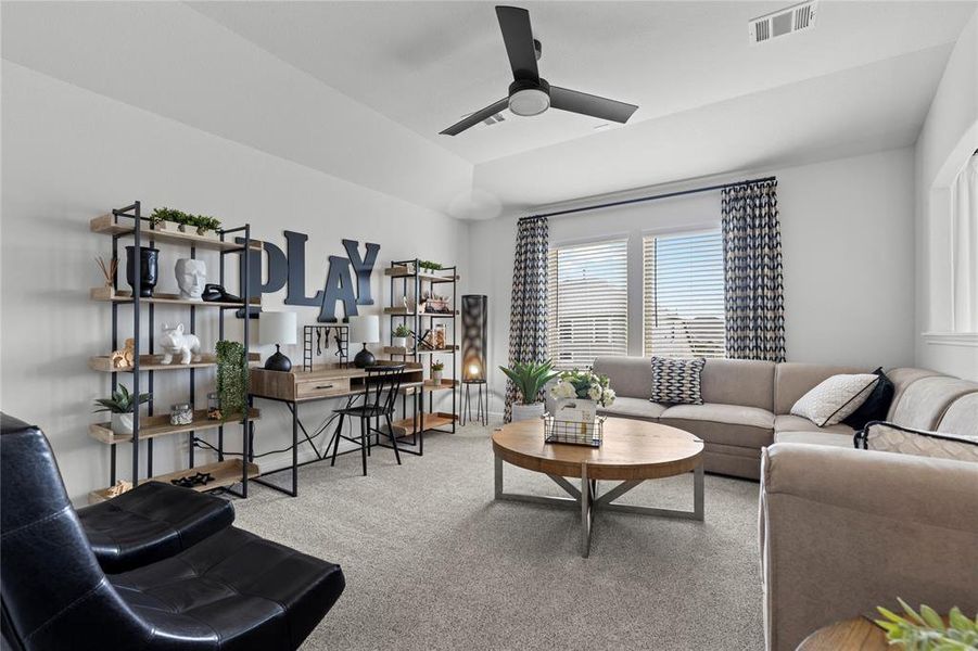 The spacious game room layout is ideal for entertaining guests. **This image is from another Saratoga Home with similar floor plan.