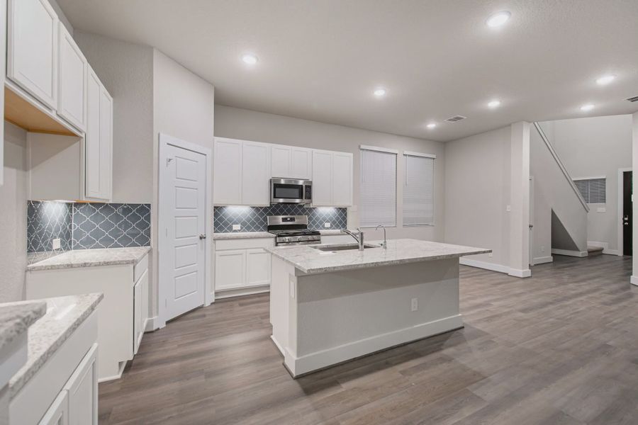 Representative furnished interior of a home built from the Sterling by Chesmar Homes in Stillwater Ranch, Buda (Image 8).
