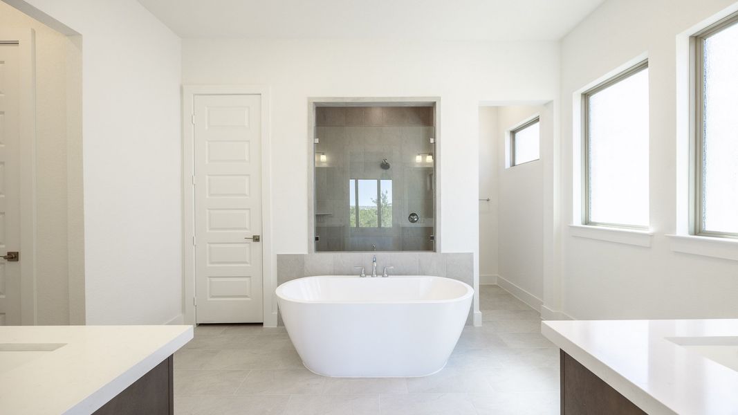 Furnished interior view inside a new home in Parkside On The River West 60', Georgetown (Image 7).