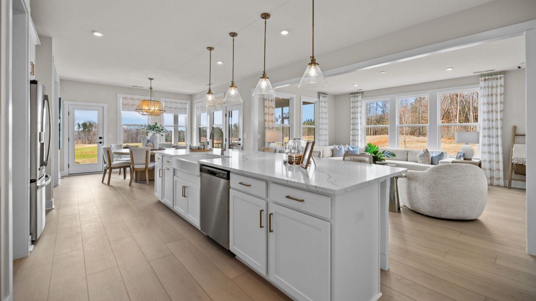 The Stonefield Home Plan in Michaux Garden by DRB Homes in Belmont, NC. -Kitchen