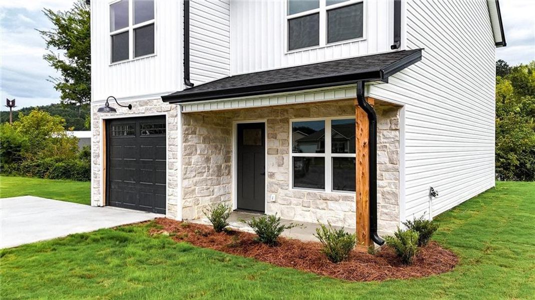 Front exterior of a new home in , Calhoun, GA, highlighting curb appeal (Image 18).