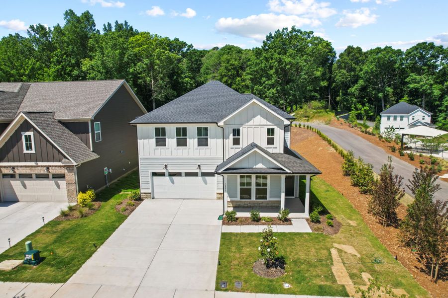 Front exterior of a new home in Elmbrook, Indian Trail, NC, highlighting curb appeal (Image 2). Front exterior of a new home in Elmbrook, Indian Trail, NC, highlighting curb appeal (Image 2).